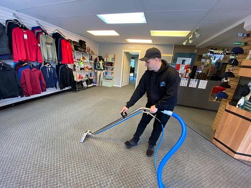  Vacuuming in a department store